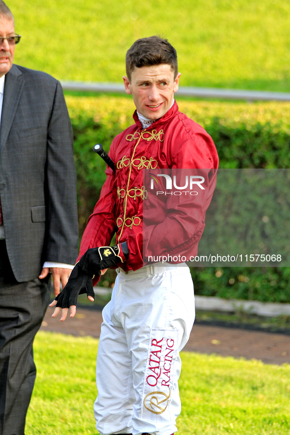 Jockey Oisin Murphy waits for his mount in the walking ring ahead of a win on New Century in the bet365 Summer Stakes (Grade I) at Woodbine...