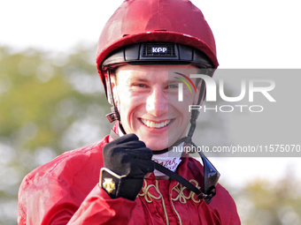 Jockey Oisin Murphy smiles after riding New Century (10) to a win in the bet365 Summer Stakes (Grade I) at Woodbine Racetrack in Toronto, Ca...