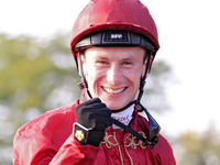 Jockey Oisin Murphy smiles after riding New Century (10) to a win in the bet365 Summer Stakes (Grade I) at Woodbine Racetrack in Toronto, Ca...