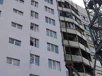 One of the residential buildings damaged by Russian shelling, where reconstruction work is underway, in Kharkiv, Ukraine, on September 12, 2...