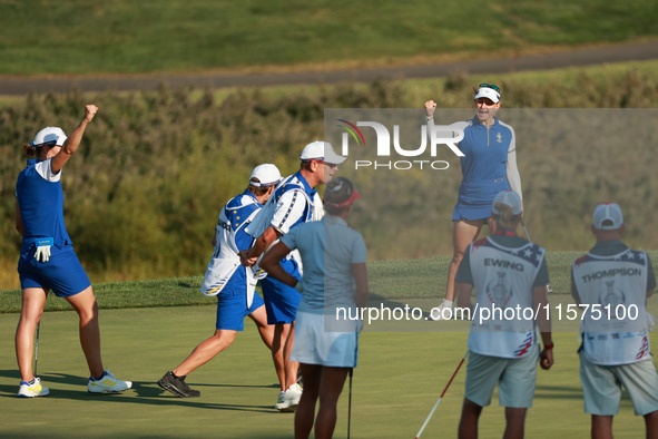 GAINESVILLE, VIRGINIA - SEPTEMBER 14: Emily Kristine Pedersen of Team Europe reats to her putt on the 15th green during Fourball Matches on...