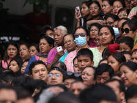 Revelers watch the sacred pole Ya:shi erection procession at Kathmandu Durbar Square in Kathmandu, Nepal, on September 15, 2024, ahead of th...