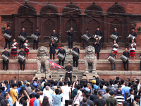 A Nepali musical band dons Newari attire and plays traditional musical instruments ahead of the formal start of Indra Jatra dedicated to the...