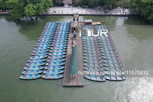 Boats are moored at the dock to prepare for Typhoon Bebinca in Hangzhou, China, on September 15, 2024. 