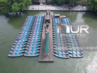 Boats are moored at the dock to prepare for Typhoon Bebinca in Hangzhou, China, on September 15, 2024. (