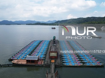 Boats are moored at the dock to prepare for Typhoon Bebinca in Hangzhou, China, on September 15, 2024. (