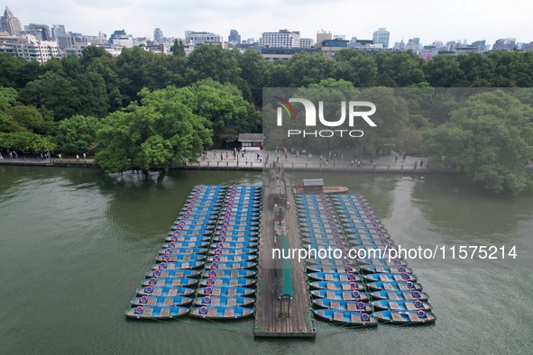 Boats are moored at the dock to prepare for Typhoon Bebinca in Hangzhou, China, on September 15, 2024. 