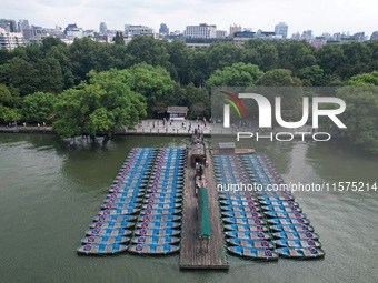 Boats are moored at the dock to prepare for Typhoon Bebinca in Hangzhou, China, on September 15, 2024. (