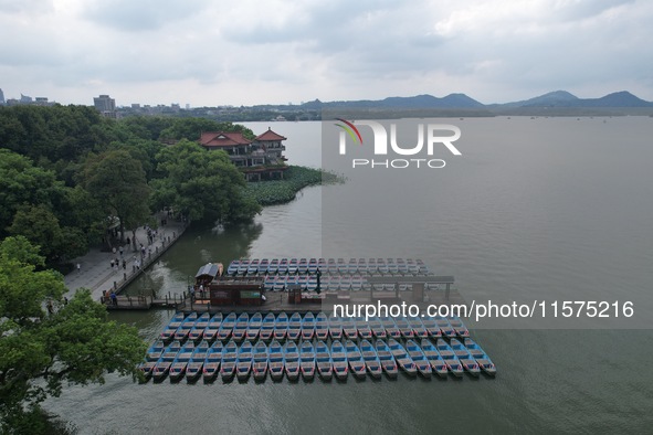 Boats are moored at the dock to prepare for Typhoon Bebinca in Hangzhou, China, on September 15, 2024. 