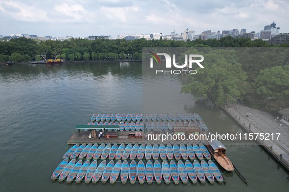 Boats are moored at the dock to prepare for Typhoon Bebinca in Hangzhou, China, on September 15, 2024. 