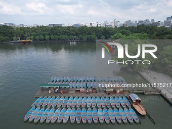 Boats are moored at the dock to prepare for Typhoon Bebinca in Hangzhou, China, on September 15, 2024. (