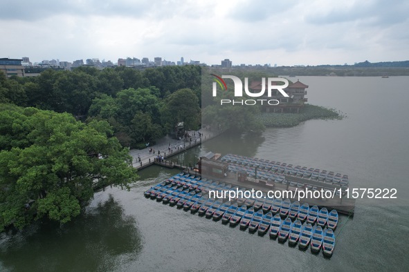 Boats are moored at the dock to prepare for Typhoon Bebinca in Hangzhou, China, on September 15, 2024. 