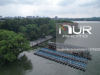 Boats are moored at the dock to prepare for Typhoon Bebinca in Hangzhou, China, on September 15, 2024. (