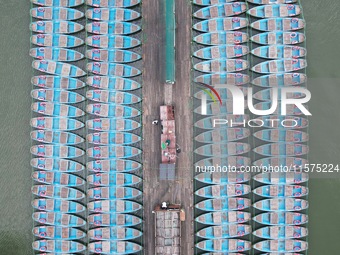 Boats are moored at the dock to prepare for Typhoon Bebinca in Hangzhou, China, on September 15, 2024. (