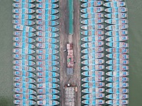 Boats are moored at the dock to prepare for Typhoon Bebinca in Hangzhou, China, on September 15, 2024. (