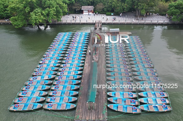 Boats are moored at the dock to prepare for Typhoon Bebinca in Hangzhou, China, on September 15, 2024. 