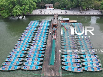 Boats are moored at the dock to prepare for Typhoon Bebinca in Hangzhou, China, on September 15, 2024. (