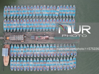 Boats are moored at the dock to prepare for Typhoon Bebinca in Hangzhou, China, on September 15, 2024. (