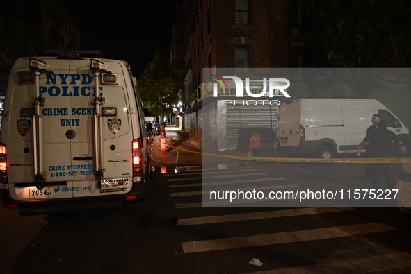 The crime scene unit is on the scene. One man is dead and another man is injured but is expected to survive after a shooting in Bronx, New Y...