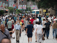 Tourists are seen on the Nanjing Road Pedestrian Street on the first day of the Mid-Autumn Festival holiday in Shanghai, China, on September...