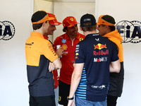 Lando Norris of McLaren, Charles Leclerc, Carlos Sainz of Ferrari, Max Verstappen of Red Bull Racing and Lando Norris of McLaren ahead of th...