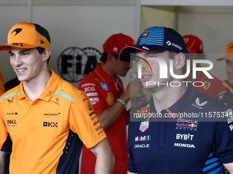 Lando Norris of McLaren and Max Verstappen of Red Bull Racing ahead of the Formula 1 Grand Prix of Azerbaijan at Baku City Circuit in Baku,...