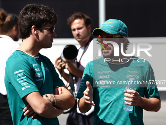 Lance Stroll and Fernando Alonso of Aston Martin Aramco ahead of the Formula 1 Grand Prix of Azerbaijan at Baku City Circuit in Baku, Azerba...