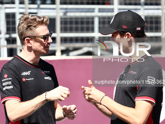 Nico Hulkenberg and Oliver Bearman of Haas ahead of the Formula 1 Grand Prix of Azerbaijan at Baku City Circuit in Baku, Azerbaijan on Septe...