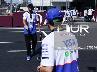 Daniel Ricciardo and Yuki Tsunoda of RB ahead of the Formula 1 Grand Prix of Azerbaijan at Baku City Circuit in Baku, Azerbaijan on Septembe...