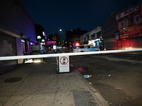 Police guard the crime scene. An unidentified man is fatally stabbed in Brooklyn, New York, United States, on September 15, 2024. On Sunday...