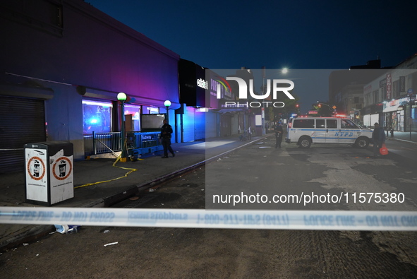 Police guard the scene. An unidentified man is fatally stabbed in Brooklyn, New York, United States, on September 15, 2024. On Sunday mornin...