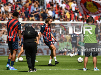 Stefanos Tsitsipas on the pitch with Genoa for the warm-up during the Serie A ENILIVE 24/25 match between Genoa CFC and AS Roma at Stadio Lu...