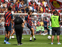 Stefanos Tsitsipas on the pitch with Genoa for the warm-up during the Serie A ENILIVE 24/25 match between Genoa CFC and AS Roma at Stadio Lu...