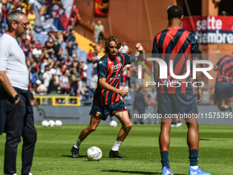 Stefanos Tsitsipas on the pitch with Genoa for the warm-up during the Serie A ENILIVE 24/25 match between Genoa CFC and AS Roma at Stadio Lu...