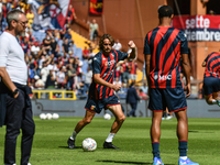 Stefanos Tsitsipas on the pitch with Genoa for the warm-up during the Serie A ENILIVE 24/25 match between Genoa CFC and AS Roma at Stadio Lu...