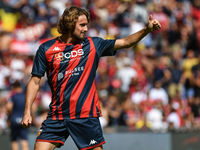 Stefanos Tsitsipas on the pitch with Genoa for the warm-up during the Serie A ENILIVE 24/25 match between Genoa CFC and AS Roma at Stadio Lu...