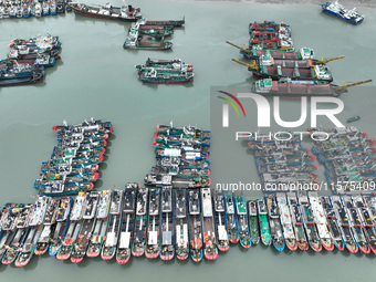 A large number of fishing boats moor at Shenjiamen Fishing Port to avoid Typhoon Bebinca in Zhoushan, China, on September 15, 2024. (