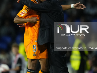 Kylian Mbappe centre-forward of Real Madrid and France greet to Carlo Ancelotti head coach of Real Madrid during the La Liga match between R...