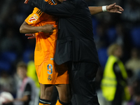 Kylian Mbappe centre-forward of Real Madrid and France greet to Carlo Ancelotti head coach of Real Madrid during the La Liga match between R...