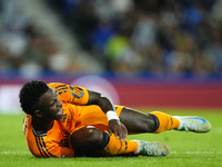 Vinicius Junior left winger of Real Madrid and Brazil lies injured on the pitch during the La Liga match between Real Sociedad de Futbol and...