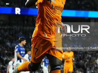 Vinicius Junior left winger of Real Madrid and Brazil celebrates after scoring his sides first goal during the La Liga match between Real So...