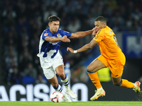 Kylian Mbappe centre-forward of Real Madrid and France and Martin Zubimendi defensive midfield of Real Sociedad and Spain compete for the ba...