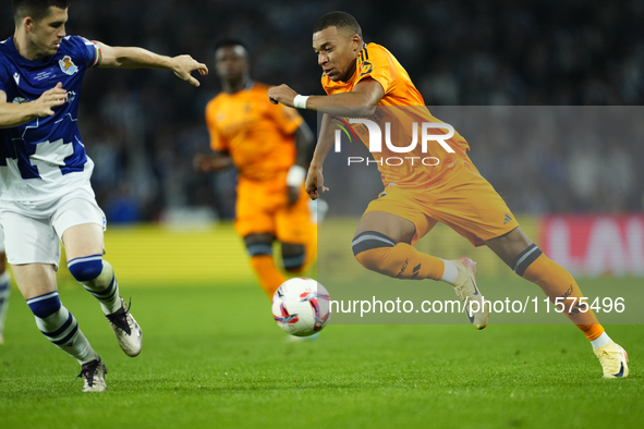 Kylian Mbappe centre-forward of Real Madrid and France in action during the La Liga match between Real Sociedad de Futbol and Real Madrid CF...