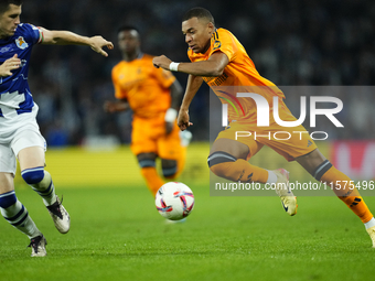 Kylian Mbappe centre-forward of Real Madrid and France in action during the La Liga match between Real Sociedad de Futbol and Real Madrid CF...