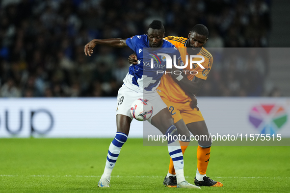 Umar Sadiq centre-forward of Real Sociedad and Nigeria and Antonio Rudiger centre-back of Real Madrid and Germany compete for the ball durin...