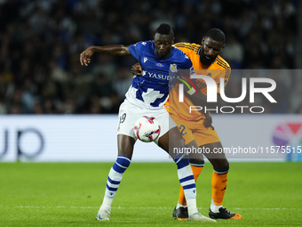 Umar Sadiq centre-forward of Real Sociedad and Nigeria and Antonio Rudiger centre-back of Real Madrid and Germany compete for the ball durin...