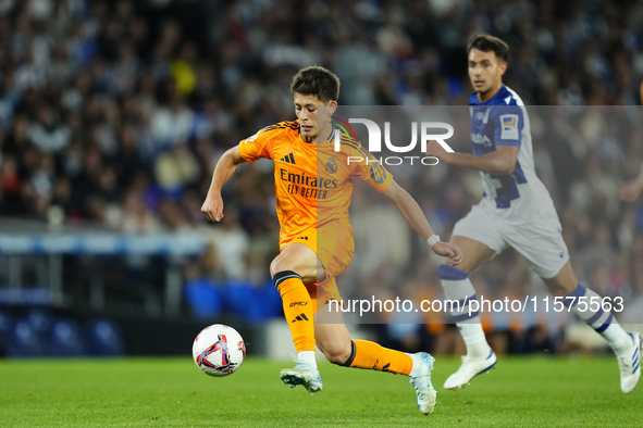 Arda Guler attacking midfield of Real Madrid and Turkey controls the ball during the La Liga match between Real Sociedad de Futbol and Real...