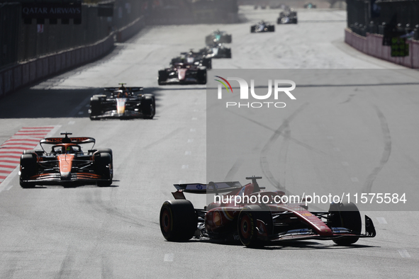 Charles Leclerc of Ferrari, Lando Norris of McLaren and Sergio Perez of Red Bull Racing during the Formula 1 Grand Prix of Azerbaijan at Bak...