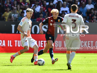 #56 Alexis Saelemaekers of Roma passes the ball during the Serie A ENILIVE 24/25 match between Genoa CFC and AS Roma at Stadio Luigi Ferrari...