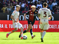 #56 Alexis Saelemaekers of Roma passes the ball during the Serie A ENILIVE 24/25 match between Genoa CFC and AS Roma at Stadio Luigi Ferrari...